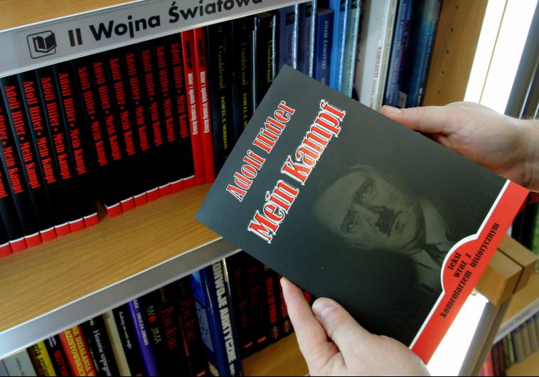 A customer holds a Polish copy of Adolf Hitler's Mein Kampf at a book store in Wroclaw, south western Poland February 23, 2005