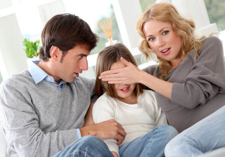 Parents preventing child from watching violent movie