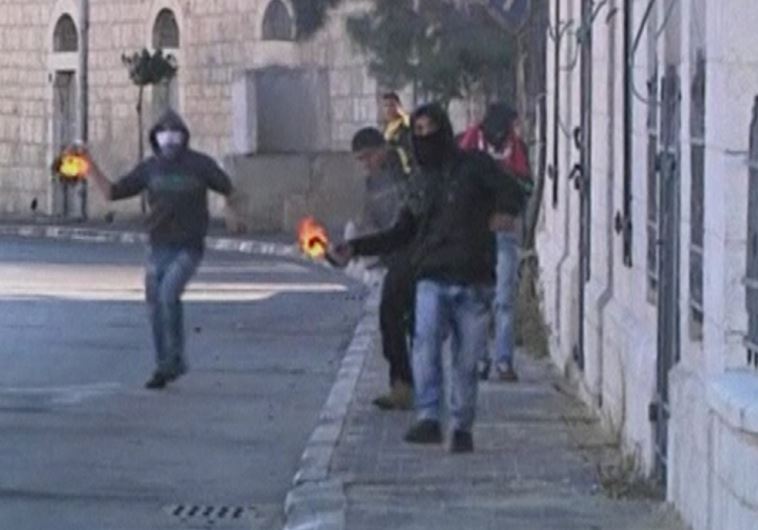 Palestinians stone throwing youths clash with Israeli troops