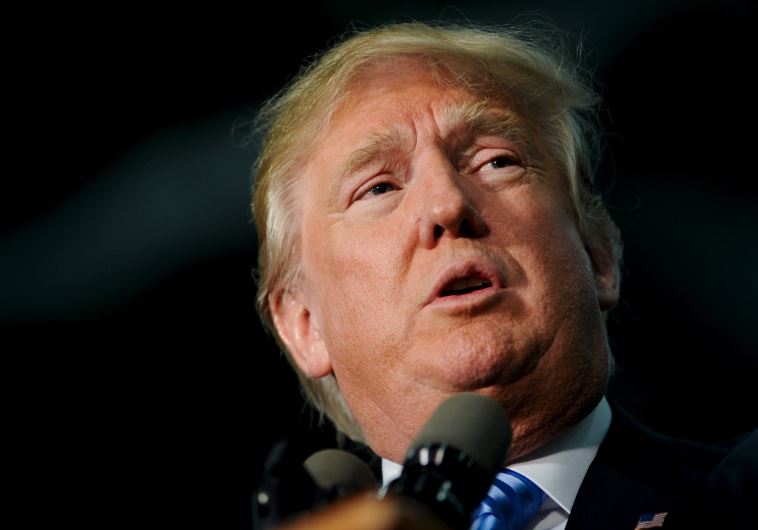US Republican presidential candidate Donald Trump speaks at a campaign stop in Spencer, Iowa
