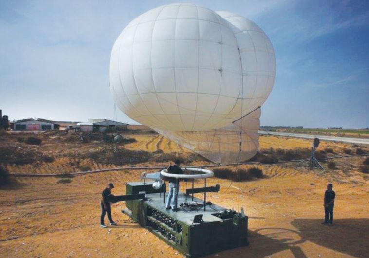 IDF SOLDIERS prepare to launch a Skystar 330 intelligence and counter-IED aerostat at a base somewhere in Israel recently