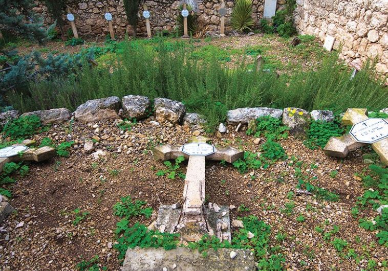 THESE CRUCIFORM TOMBSTONES were found knocked over at the Beit Jamal monastery, the result of one of several attacks against Christian sites in the Beit Shemesh area over the years.