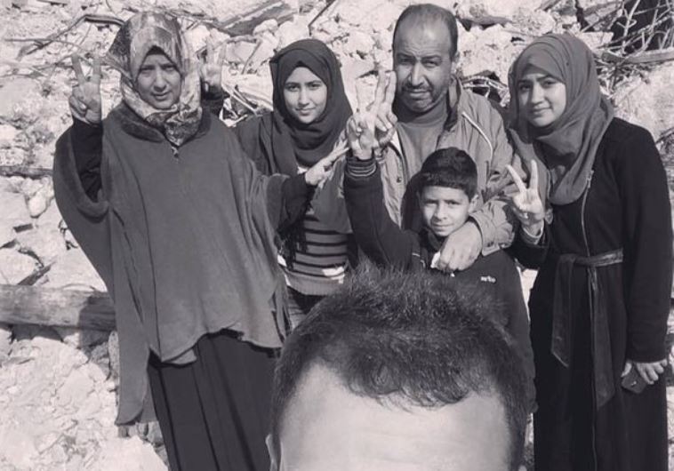 Family of Palestinian who carried out stabbing attack smiles in selfie at site of the ruins of their home, demolished by the IDF