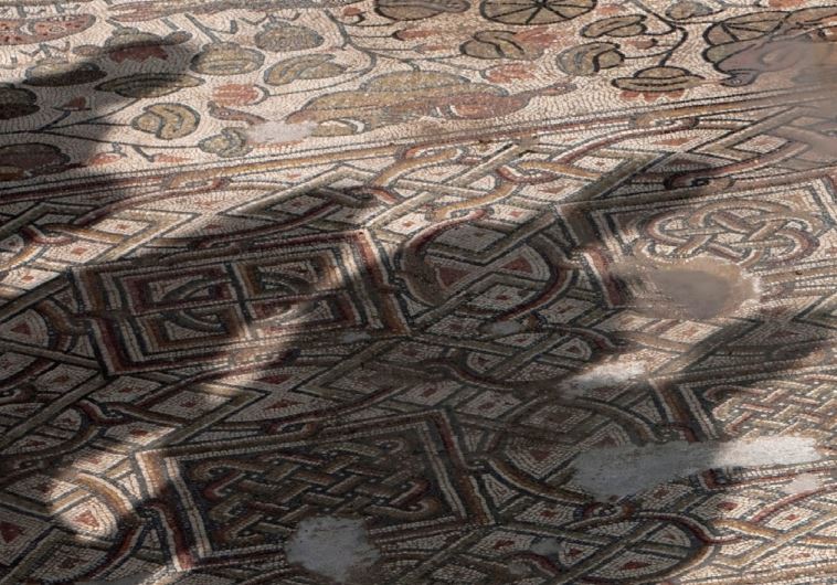 THE SHADOW of members of the media is cast on a mosaic floor of an ancient church found near Jerusalem in 2011. In the 19th century, Crusader mosaic floors were uncovered in the Dome of the Rock.