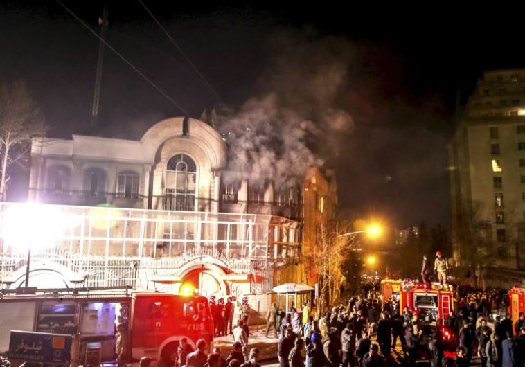 Flames rise from Saudi Arabia's embassy during a demonstration in Tehran January 2, 2016