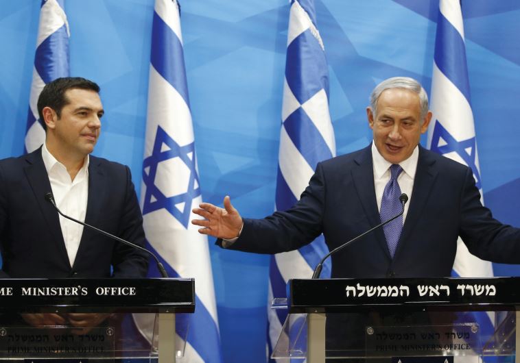 BENJAMIN NETANYAHU gestures as he delivers a joint statement with his Greek counterpart Alexis Tsipras in Jerusalem last November 25. 
