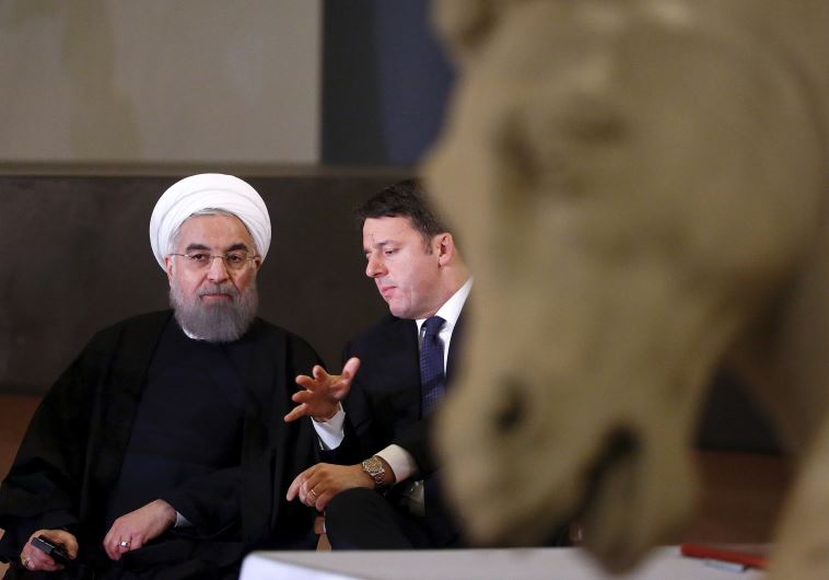 ran President Hassan Rouhani (L) talks with Italian Prime Minister Matteo Renzi at the Campidoglio palace in Rome, Italy, January 25, 2016