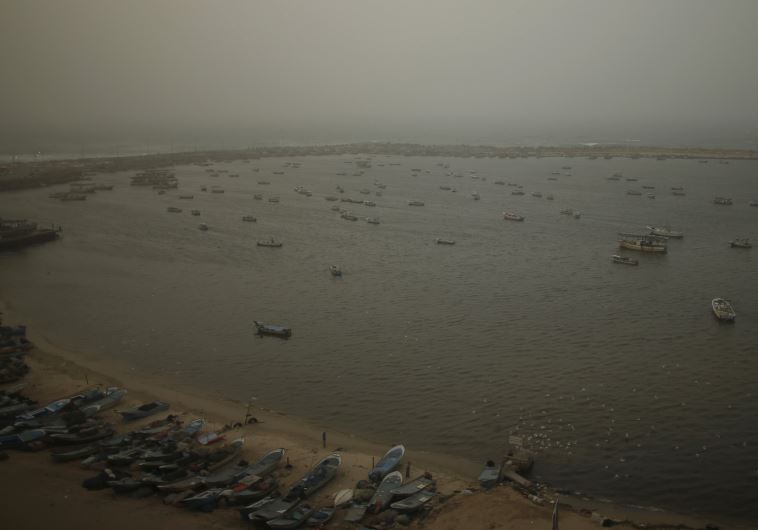 A view shows fishing boats at the seaport of Gaza City on a stormy day January 18, 2016.