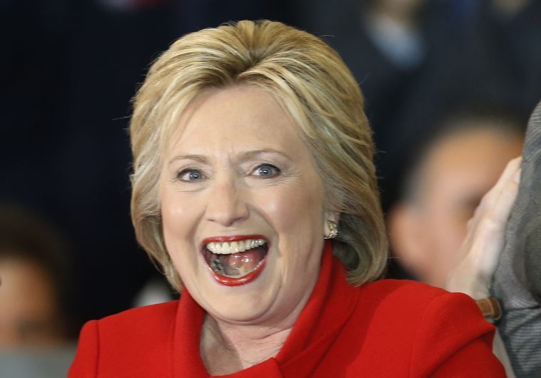 Democratic US presidential candidate Hillary Clinton celebrates at her caucus night rally in Des Moines, Iowa February 1, 2016.