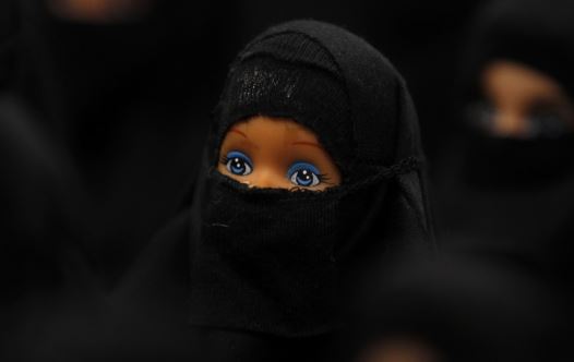 The installation 'Sheltered position' of German artist Sabine Reyer shows one hundred Barbie dolls dressed with burkas at the Ruhr-Biennale in Dortmund