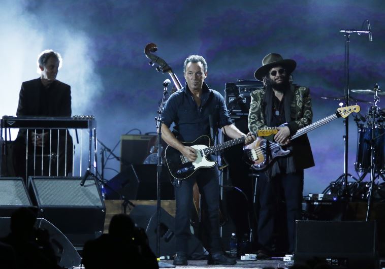 Musician Bruce Springsteen performs "Knockin' On Heavens Door" during the 2015 MusiCares Person of the Year tribute honoring Bob Dylan in Los Angeles, California.