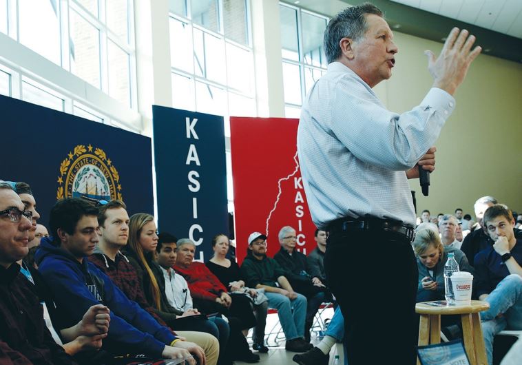 US REPUBLICAN PRESIDENTIAL candidate Ohio Gov. John Kasich speaks to voters in Nashua, New Hampshire