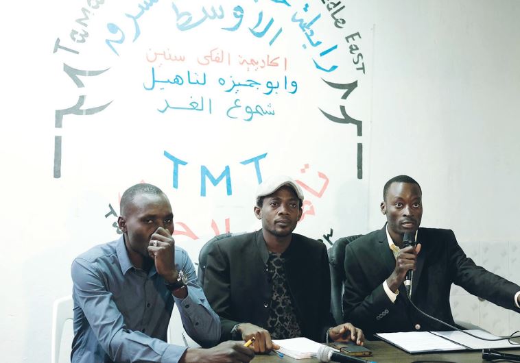 REPRESENTATIVES OF the Sudanese community speak to reporters in south Tel Aviv yesterday.