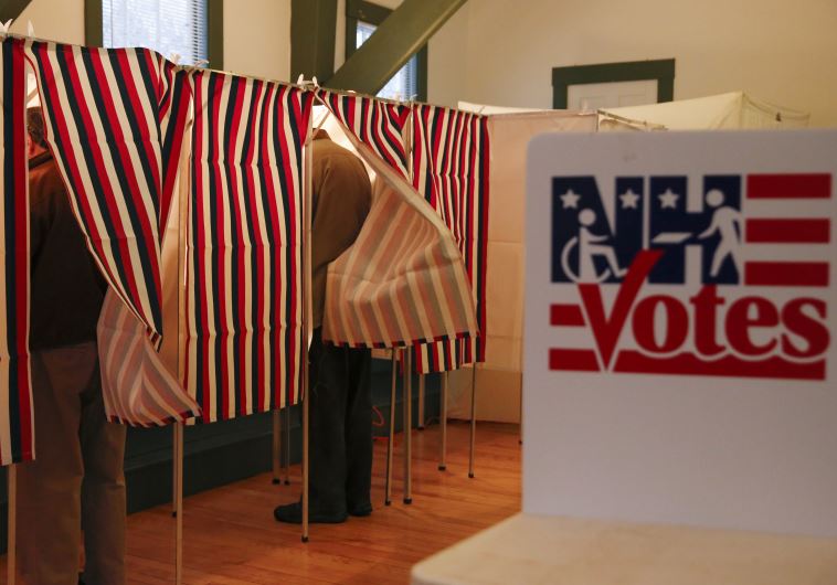People vote at a polling place at the Canterbury Town Hall polling station in Canterbury, New Hampshire February 9, 2016