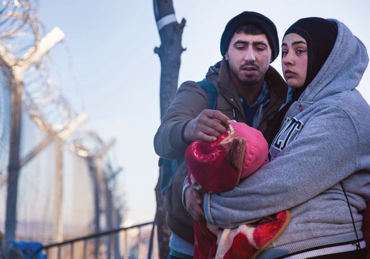 Taken soon after this Syrian couple learned they would not be allowed to cross to Macedonia