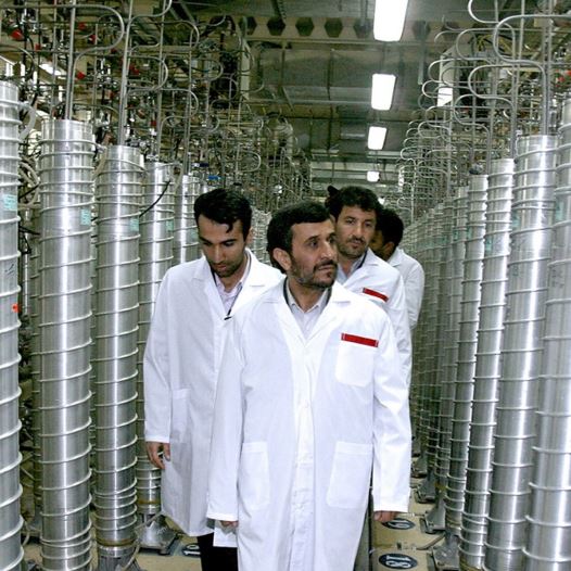Iranian President Mahmoud Ahmadinejad (C) visits the Natanz nuclear enrichment facility, 350 km (217 miles) south of Tehran, April 8, 2008