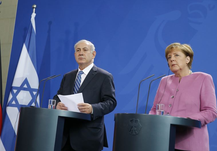 Netanyahu (L) and German Chancellor Angela Merkel address a news conference at the Chancellery in Berlin, Germany, February 16, 2016