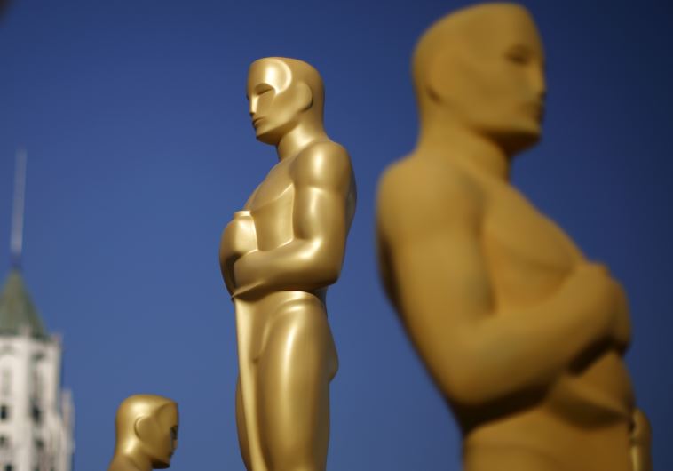 Oscar statues are painted outside the entrance to the Dolby Theatre 