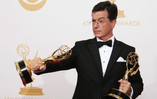 Stephen Colbert poses backstage at the 65th Primetime Emmy Awards in Los Angeles, September 22, 2013