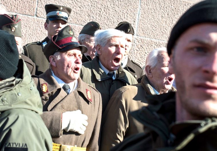 Sympathizers rally at the Freedom Monument in Riga to commemorate the Latvian Legion of the Nazi Waffen-SS, March 2015