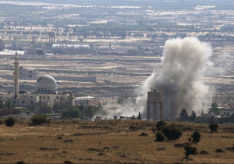 Smoke rises during fighting in the village of Ahmadiyah in Syria, as seen from the Israeli side of the border fence between Syria and the Golan Heights [File]
