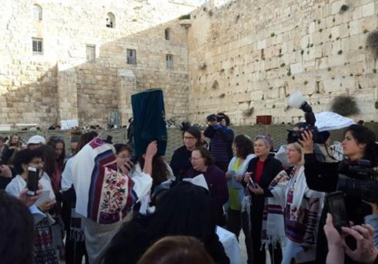 Women of the Wall with Torah scroll in women's section of the Western Wall, March 11, 2016