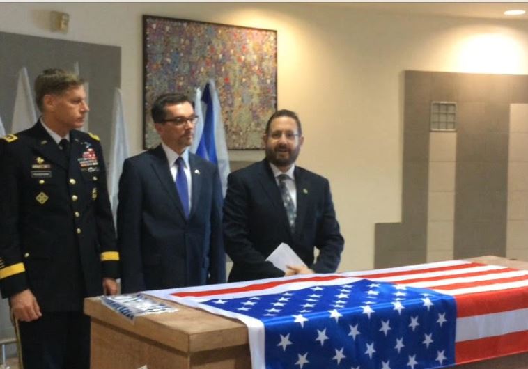 MK Dov Lipman, reading a letter from the family of terror victim Taylor Force at a small ceremony held at Ben Gurion Airport, March 11, 2016.