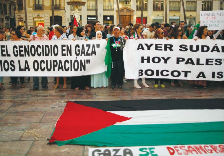 The banners read: Stop the genocide in Gaza. Stop the occupation. Yesterday South Africa, today Palestine. Boycott Israel. Gaza bleeds