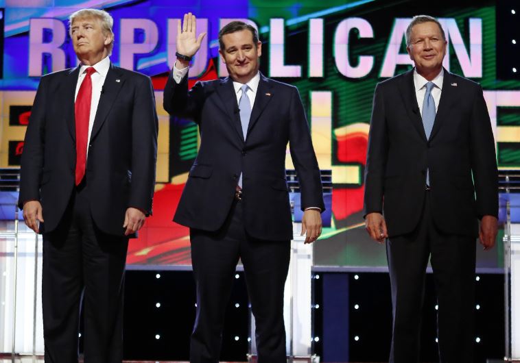 Republican US presidential candidates (L-R) Donald Trump, Ted Cruz and John Kasich stand together at a Republican candidates debate on March 10