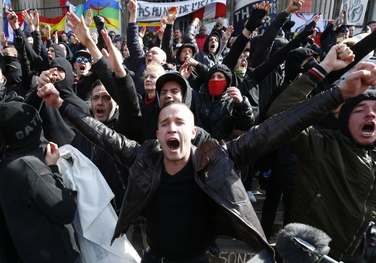 Right-wing demonstrators protest against terrorism in front of the old stock exchange in Brussels, Belgium. March 27. 2016