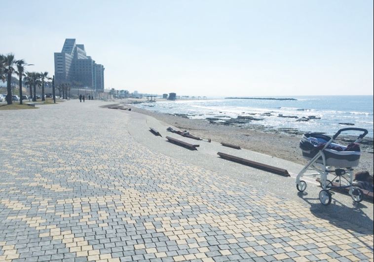 A STROLLER sits on the boardwalk in Haifa. An official report is due months after a leaked portion showed that babies born in the city had smaller heads than average.