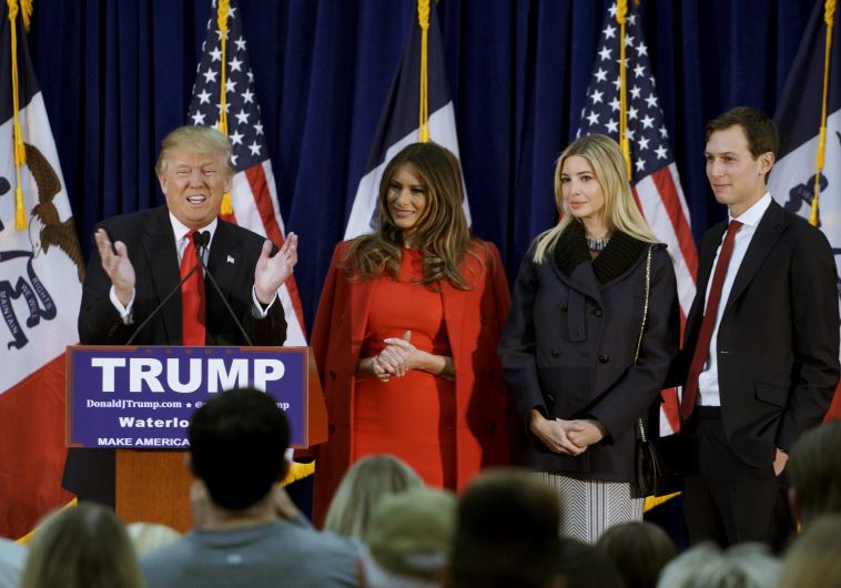 US Republican presidential candidate Donald Trump speaks as (L-R) his wife Melania, daughter Ivanka and Ivanka's husband Jared Kushner listen