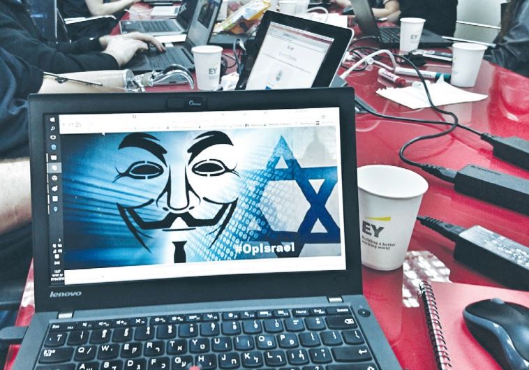 THE CERT-IL GROUP of volunteers responds to cyber-attacks in its Tel Aviv control room yesterday.