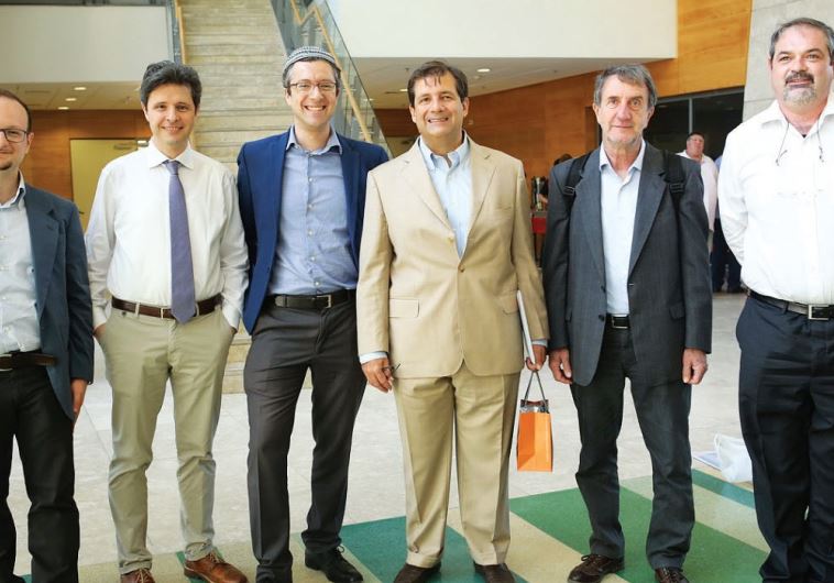 THE ITALIAN delegation poses for a photo with Italian Ambassador to Israel Francesco M. Talo (third from right) at the conference in Bar-Ilan University this week. 