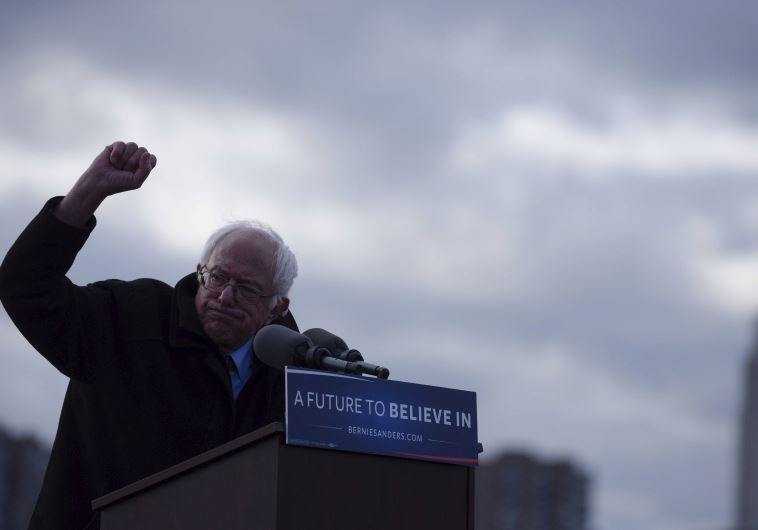 The Empire State Building is seen in the background from Transmitter Park as U.S. Democratic presidential candidate and Senator Bernie Sanders gestures during a campaign rally in the Brooklyn borough of New York April 8, 2016. 