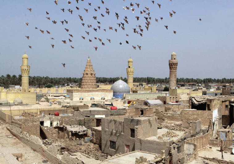 A JEWISH shrine containing the tomb of the prophet Ezekiel in the Iraqi town of Kifl, south of Baghdad. The author describes his last Passover in Iraq.