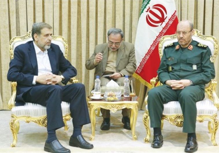 ISLAMIC JIHAD leader Ramadan Shalah (left) meets with Iranian Defense Minister Hossein Dehqan in Tehran on Tuesday