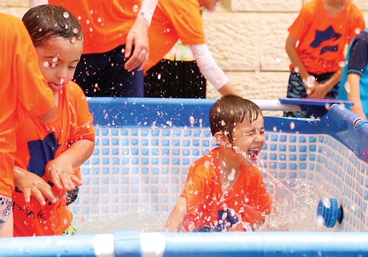 Splashing around at Ezrat Achim’s Special Summer Camp 2015