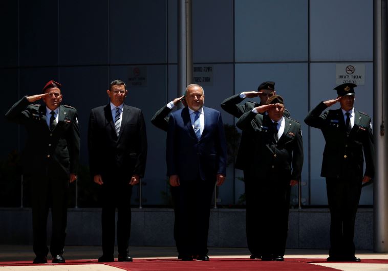 Avigdor Liberman reviews an honour guard during a welcoming ceremony at the Defence Ministry in Tel Aviv, Israel May 31, 2016