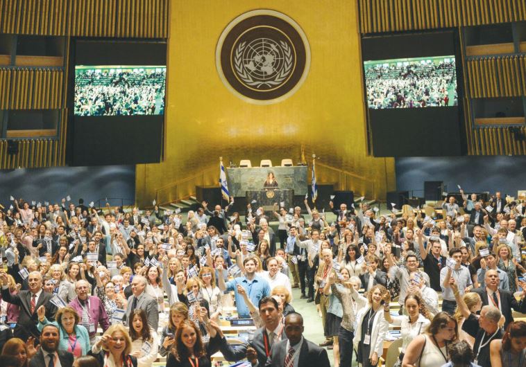 PARTICIPANTS POSE for a photo at the anti-BDS conference held at the UN General Assembly yesterday.