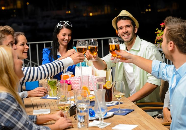 Group of young friends drinking beer