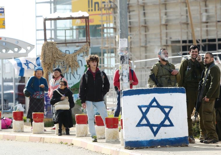 IDF soldiers patrol the Gush Etzion Junction in the West Bank, in January