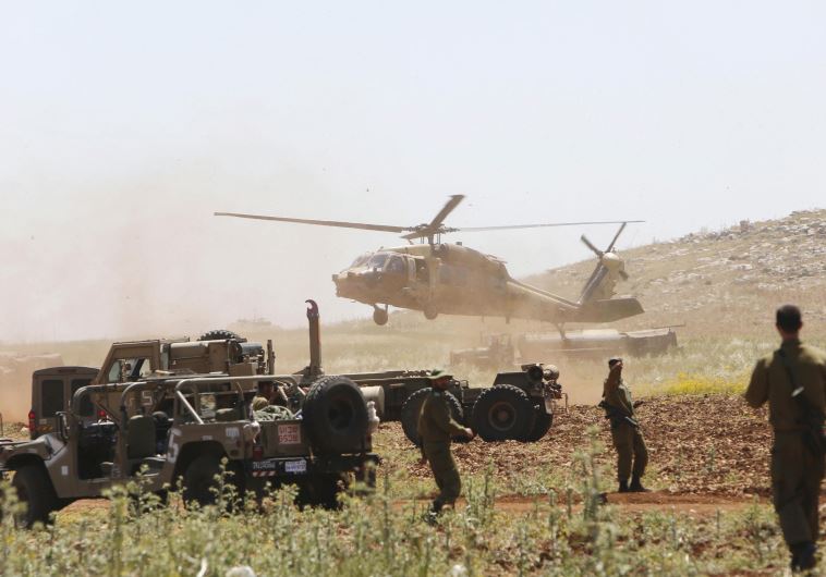 IDF SOLDIERS take part in a military exercise last year