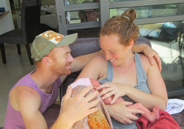 Ella and Harel Tehorlev at home with newborn Shaya