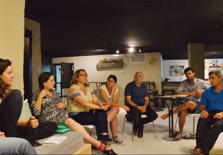 Cooperative members meet before the grand opening