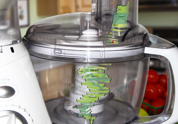 A food processor with the cut-up map of Israel inside.
