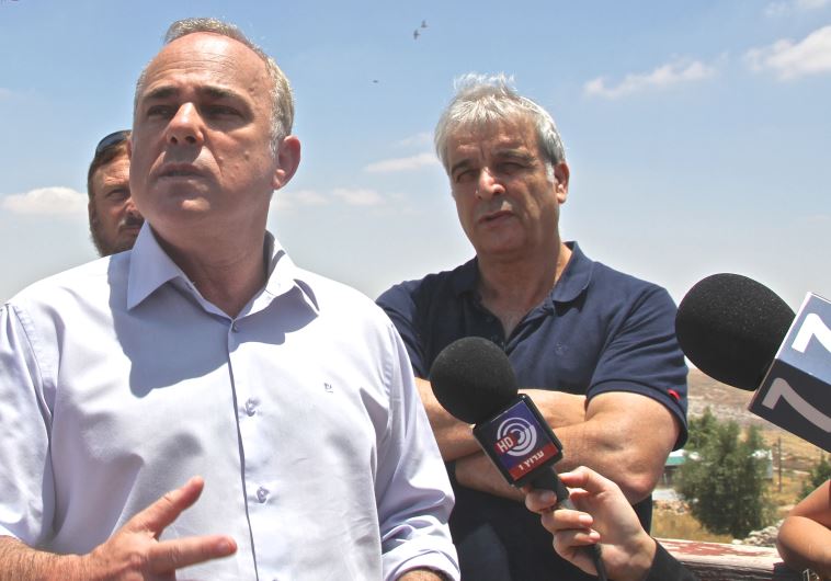 Yuval Steinitz speaking at the Amona outpost