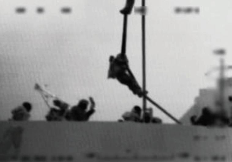 AN IDF soldier rappels onto the Mavi Marmara during the Navy raid in 2010.