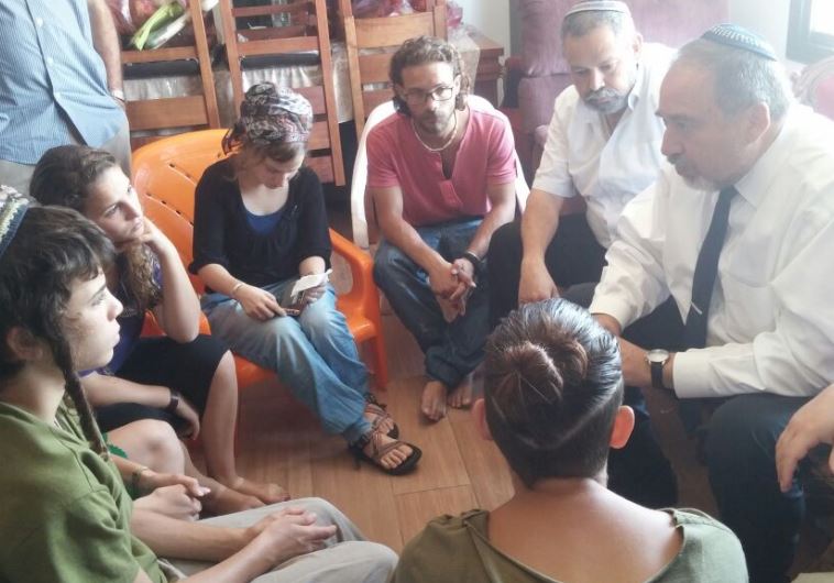 Defense Minister Avigdor Liberman meets with the Mark family children