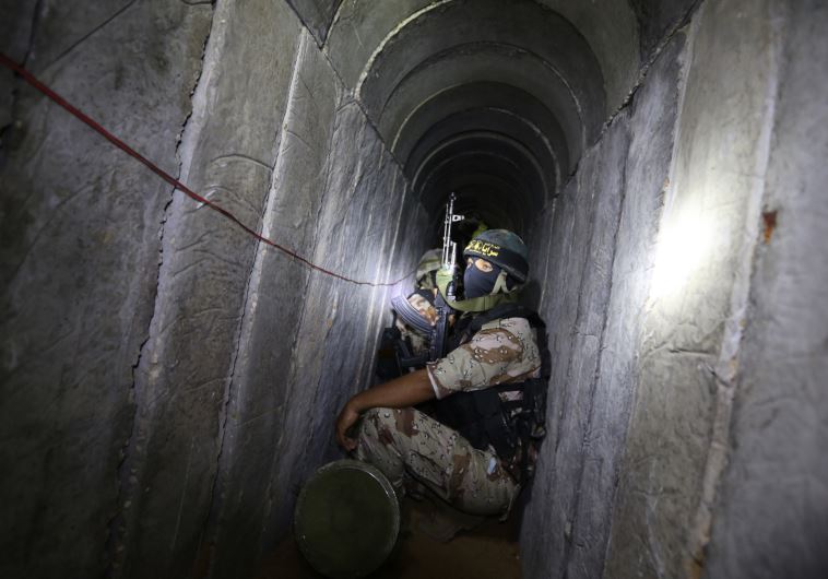 Palestinian militants from the Islamic Jihad's armed wing, the Al-Quds Brigades, in a tunnel in the south of the Gaza Strip 